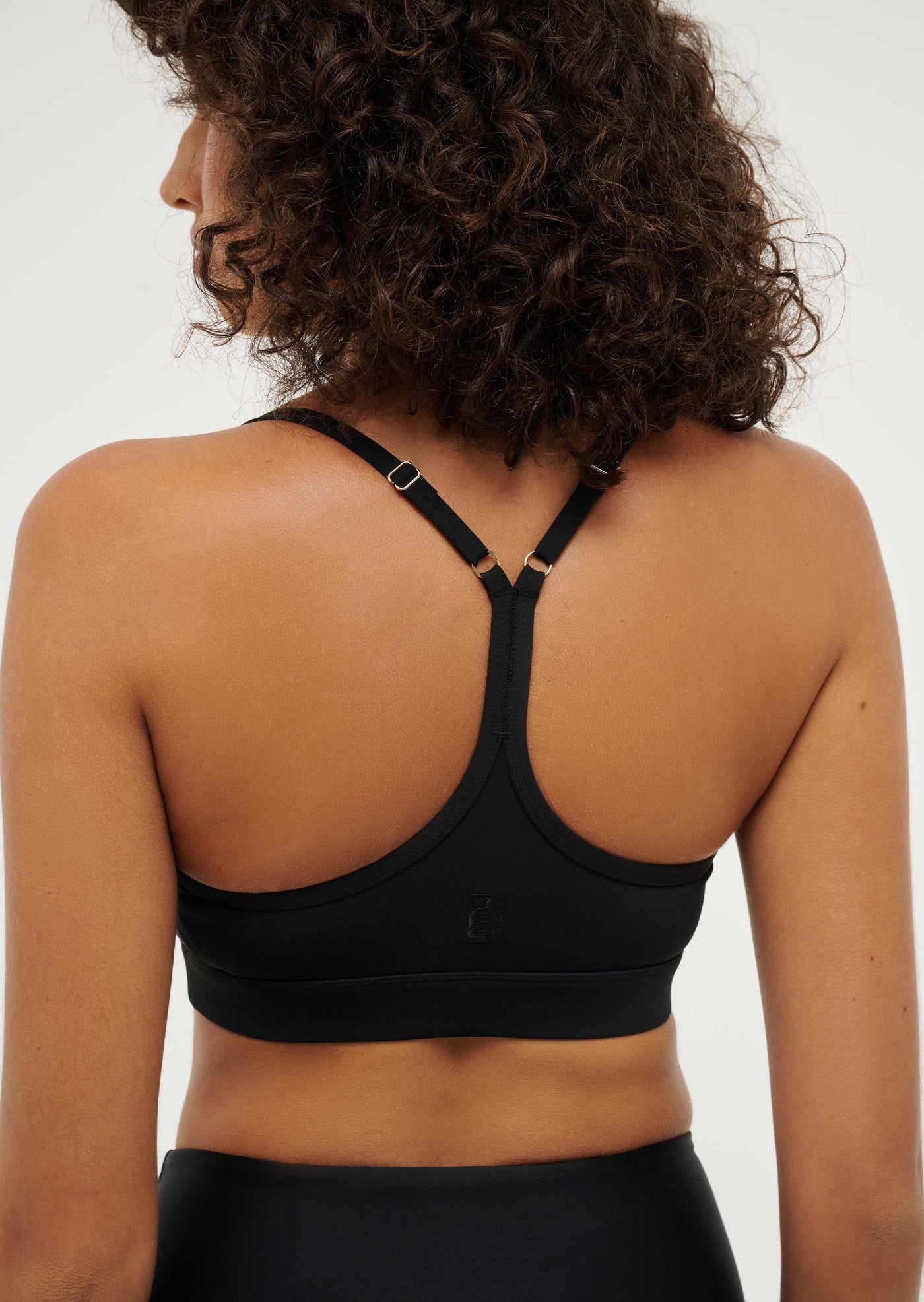 REFORM SPORTS BRA IN BLACK