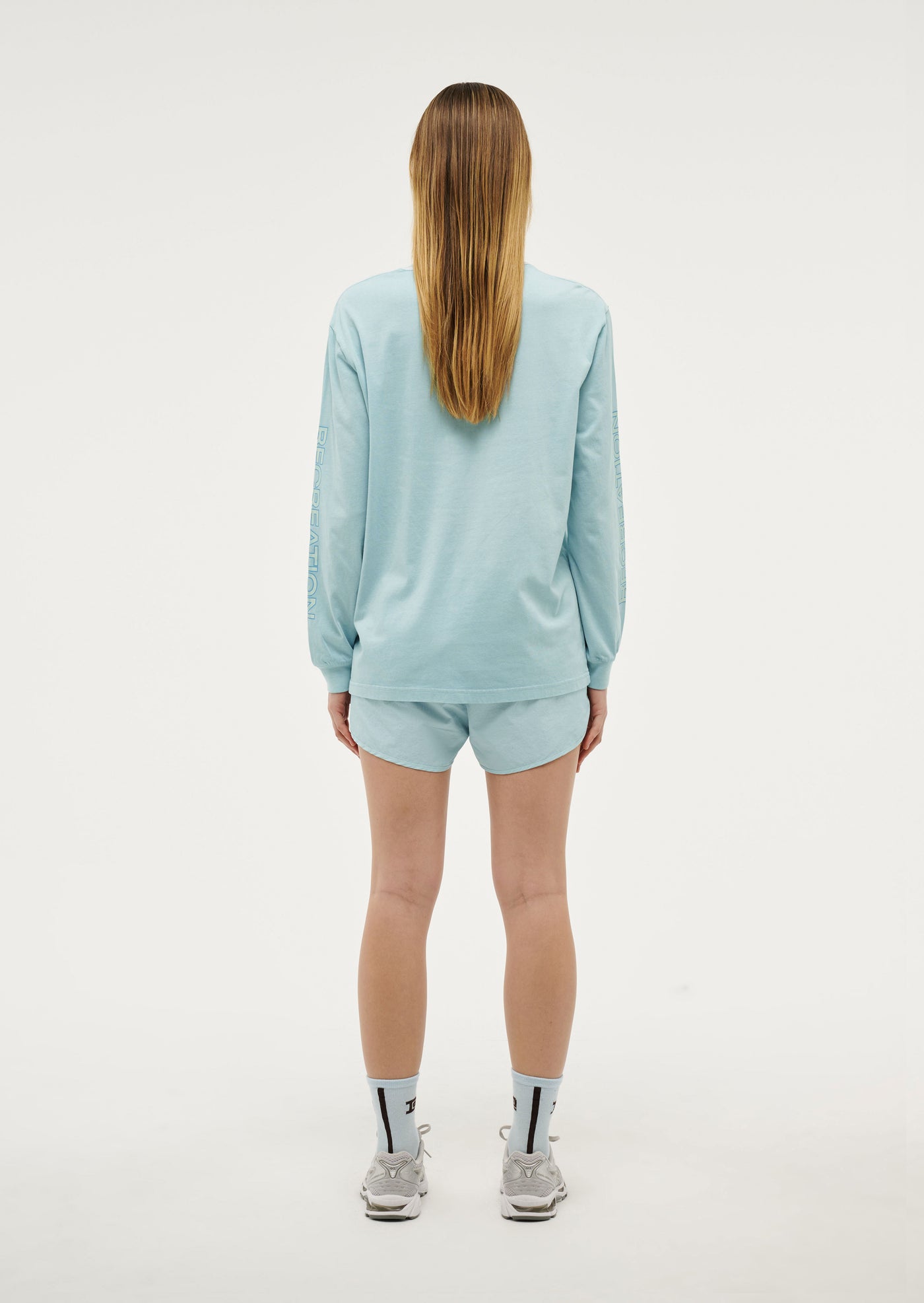 STREAMLINE LONG SLEEVE TOP IN WASHED SKY BLUE