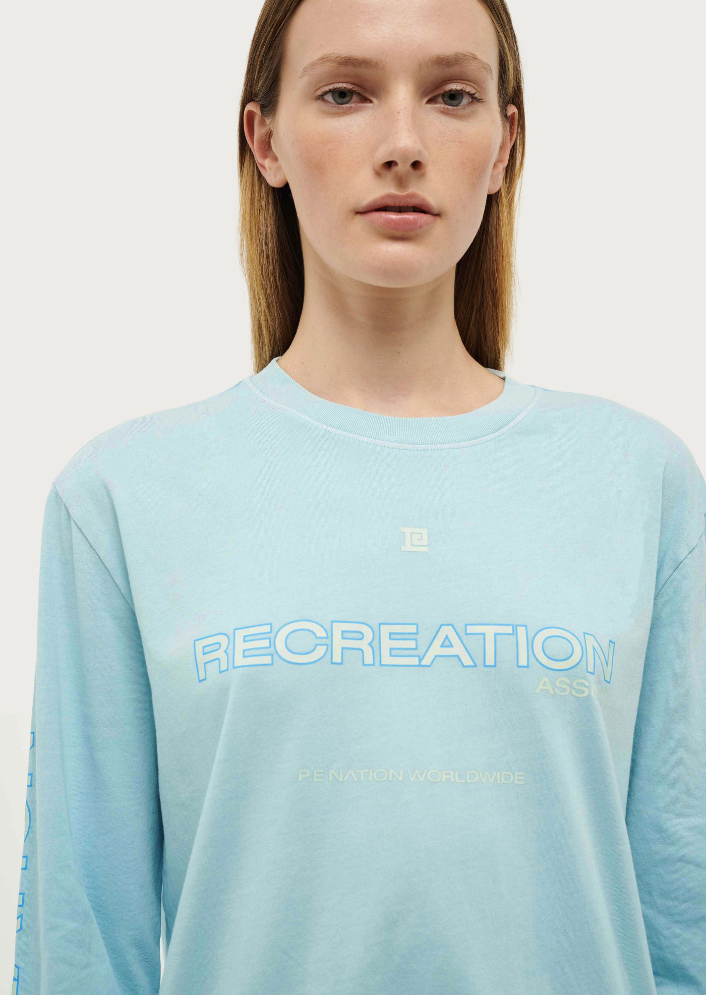 STREAMLINE LONG SLEEVE TOP IN WASHED SKY BLUE