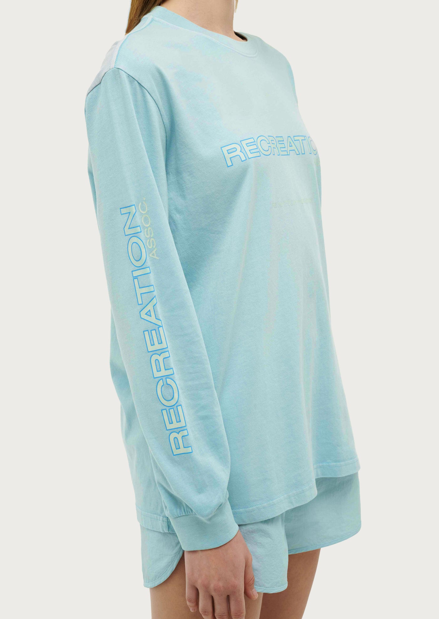 STREAMLINE LONG SLEEVE TOP IN WASHED SKY BLUE