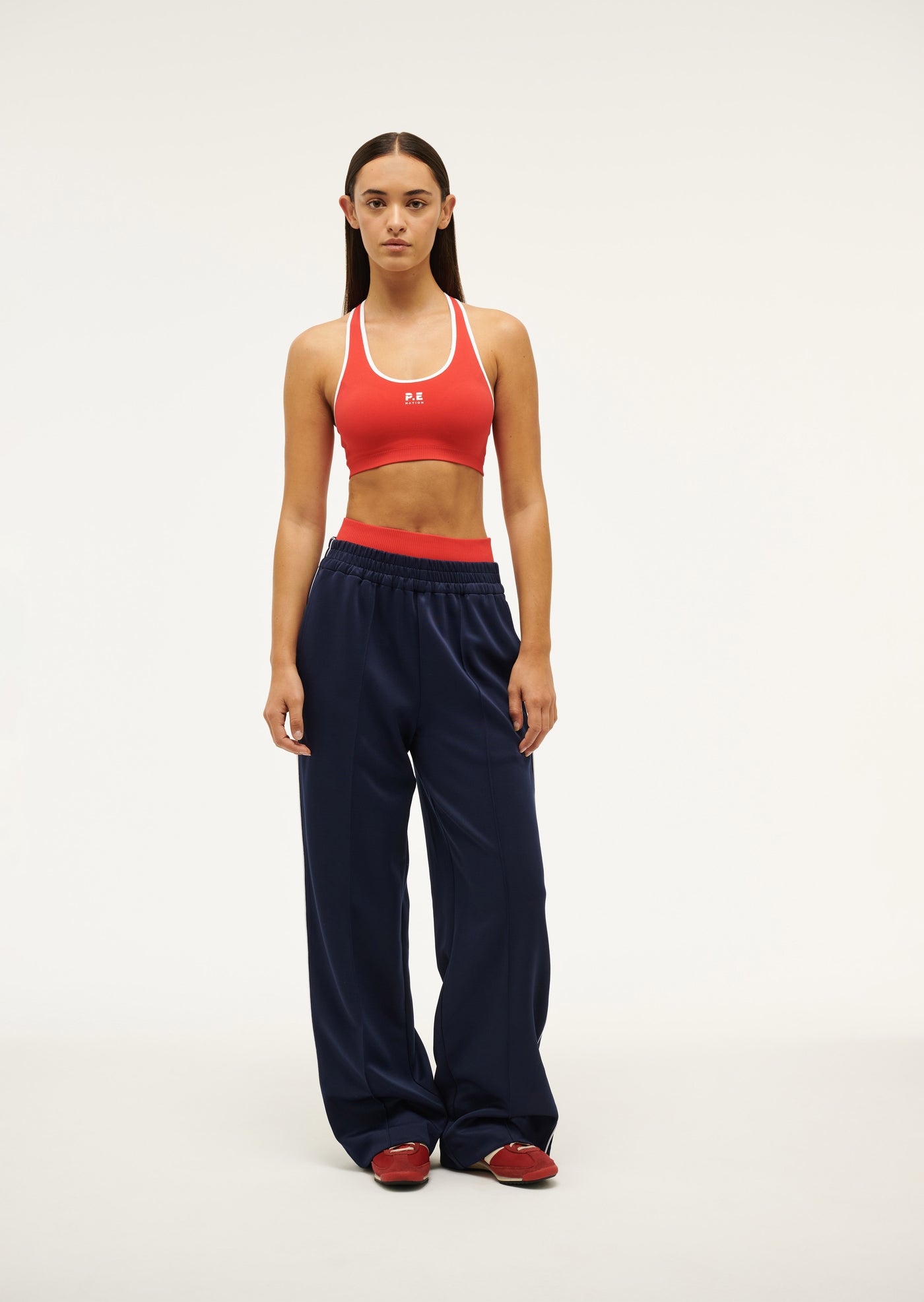 RESTORE SEAMLESS SPORTS BRA IN POPPY RED